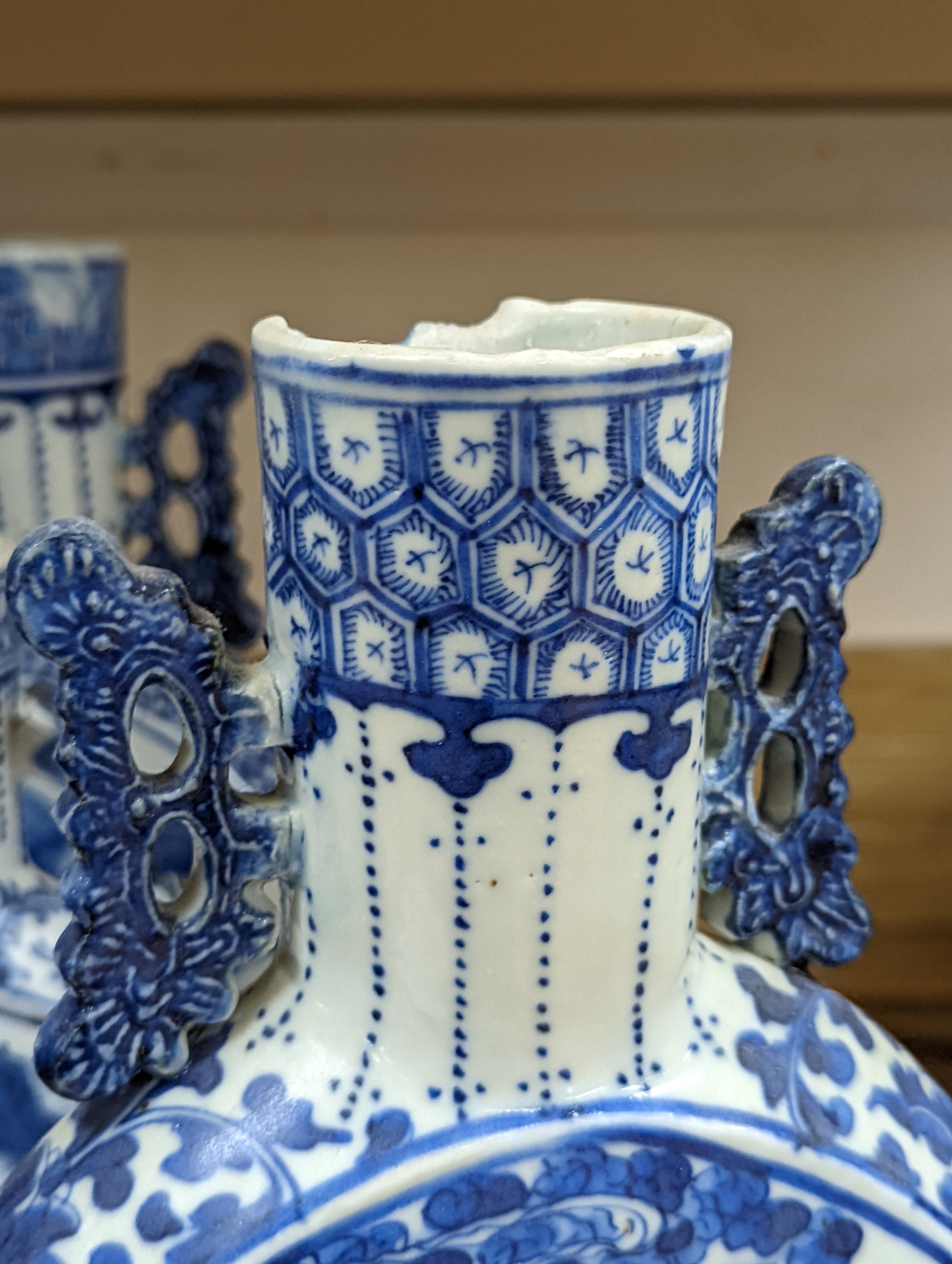 Three 19th century Chinese blue and white Moon flasks, tallest 31 cms.